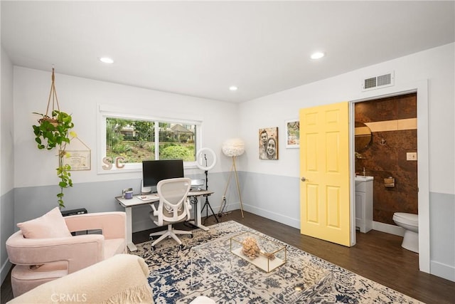 home office featuring baseboards, recessed lighting, visible vents, and wood finished floors