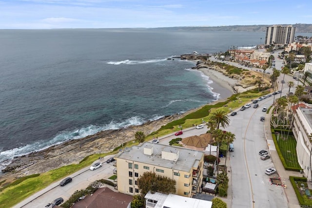 bird's eye view featuring a beach view and a water view
