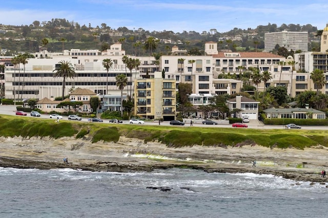 view of building exterior featuring a water view