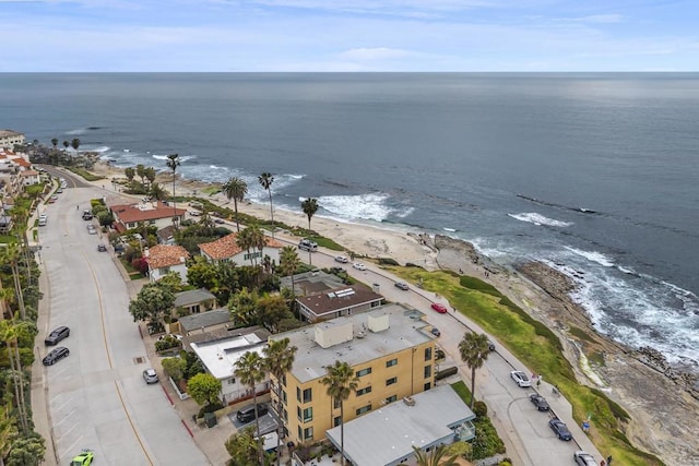 aerial view featuring a view of the beach and a water view