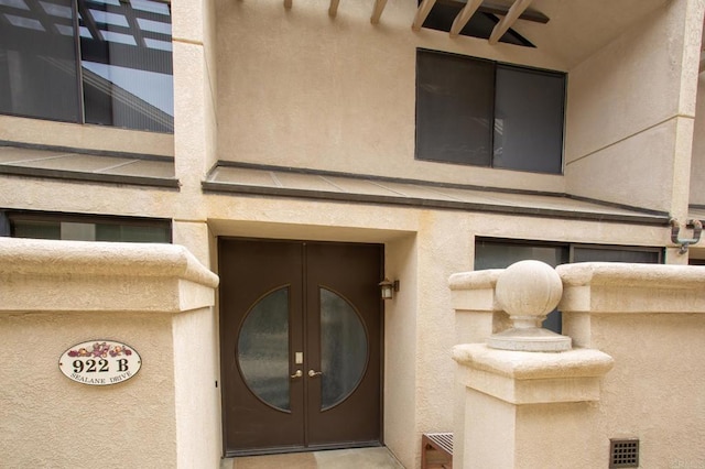 property entrance with french doors