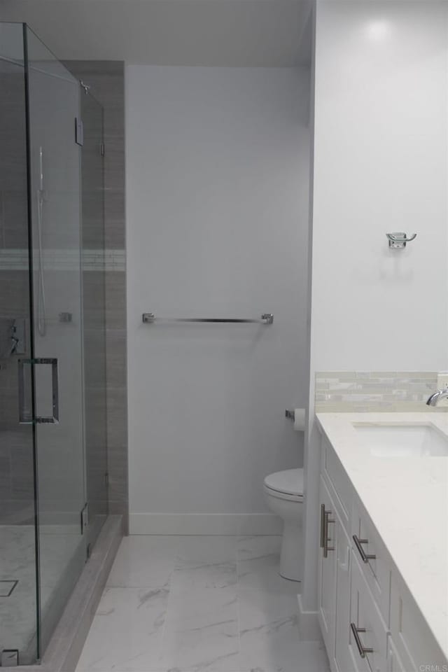 922 Sealane Dr Unit B, Encinitas, CA 92024 - bathroom featuring marble look tile flooring, a shower stall, toilet, and vanity