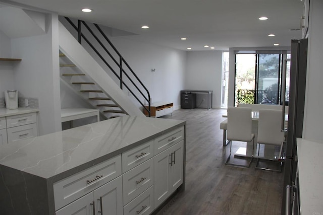 922 Sealane Dr Unit B, Encinitas, CA 92024 - kitchen with recessed lighting, dark wood-style floors, light stone counters, open shelves, and white cabinets