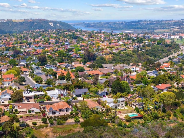 drone / aerial view with a mountain view and a residential view