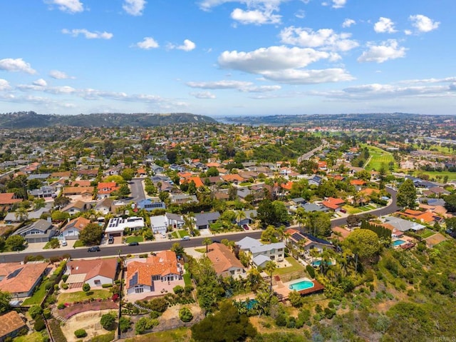 bird's eye view with a residential view and a mountain view