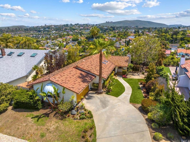birds eye view of property featuring a residential view and a mountain view
