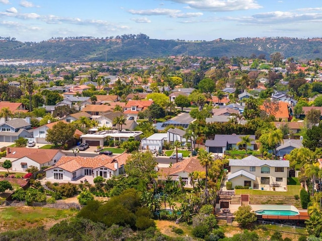 drone / aerial view with a residential view and a mountain view