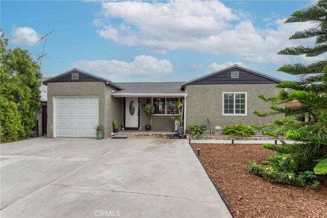 12022 W Redbank St, Sun Valley, CA 91352 - single story home featuring stucco siding, driveway, and an attached garage