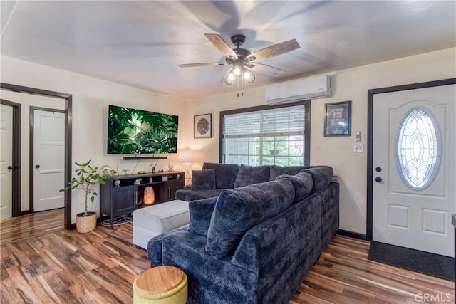 12022 W Redbank St, Sun Valley, CA 91352 - living area featuring a wall unit AC, plenty of natural light, wood finished floors, and ceiling fan