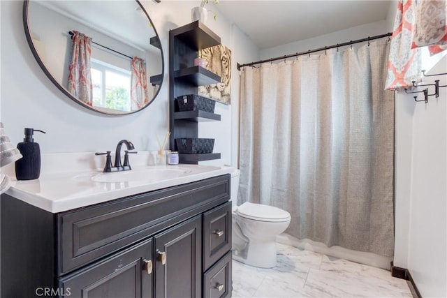 12022 W Redbank St, Sun Valley, CA 91352 - full bath with marble finish flooring, vanity, and toilet