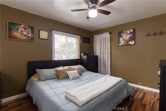 12022 W Redbank St, Sun Valley, CA 91352 - bedroom with baseboards, wood finished floors, and ceiling fan