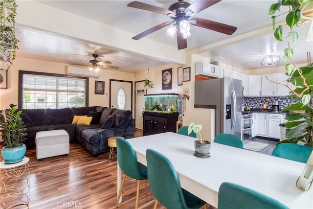 12022 W Redbank St, Sun Valley, CA 91352 - dining space featuring wood finished floors, ceiling fan, and a wall mounted AC
