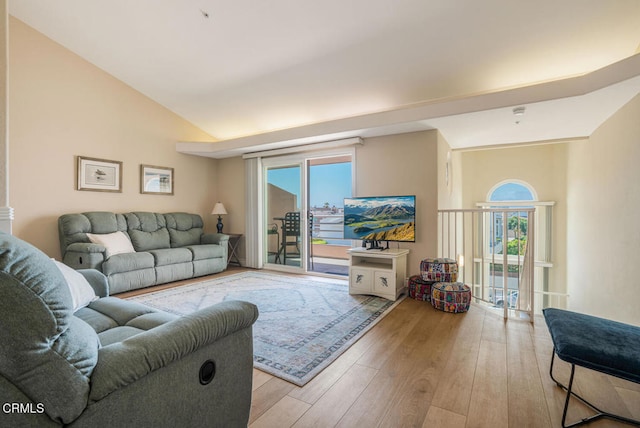 1130 Mandalay Beach Rd, Oxnard, CA 93035 - living room featuring wood finished floors and lofted ceiling