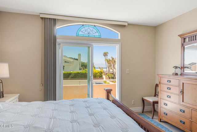 1130 Mandalay Beach Rd, Oxnard, CA 93035 - bedroom with access to outside, baseboards, and wood finished floors
