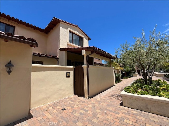 344 Triana Ln Unit 102, Avalon, CA 90704 - view of patio with a gate