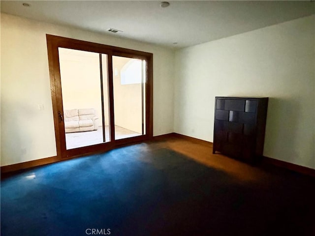 344 Triana Ln Unit 102, Avalon, CA 90704 - spare room featuring carpet and baseboards