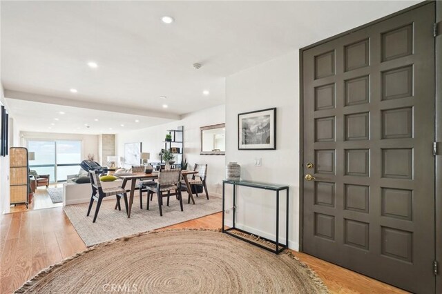 entrance foyer with recessed lighting and light wood-style floors