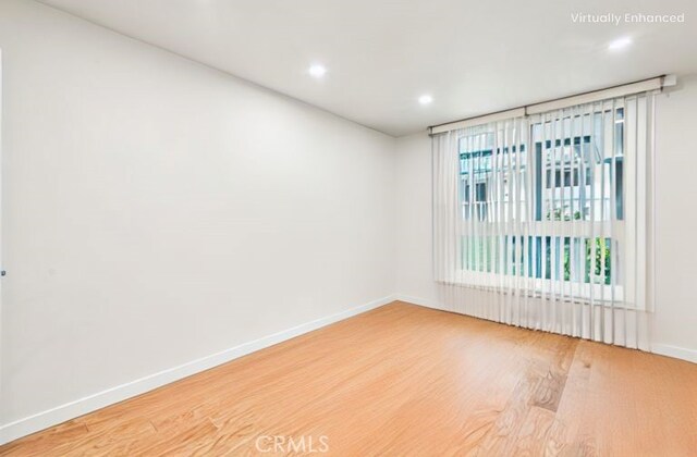 575 Esplanade Unit 205, Redondo Beach, CA 90277 - empty room featuring wood finished floors and recessed lighting
