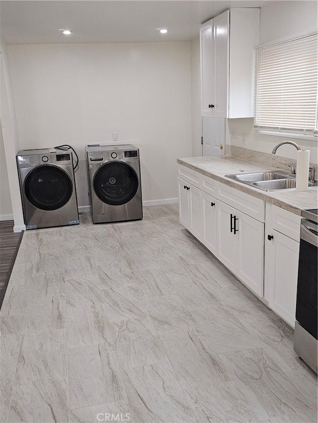 44645 Fig Ave, Lancaster, CA 93534 - laundry room featuring laundry area, a sink, baseboards, marble finish floor, and washer and dryer