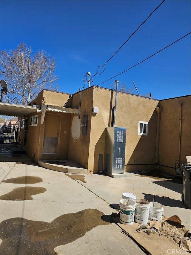 44645 Fig Ave, Lancaster, CA 93534 - rear view of house featuring stucco siding