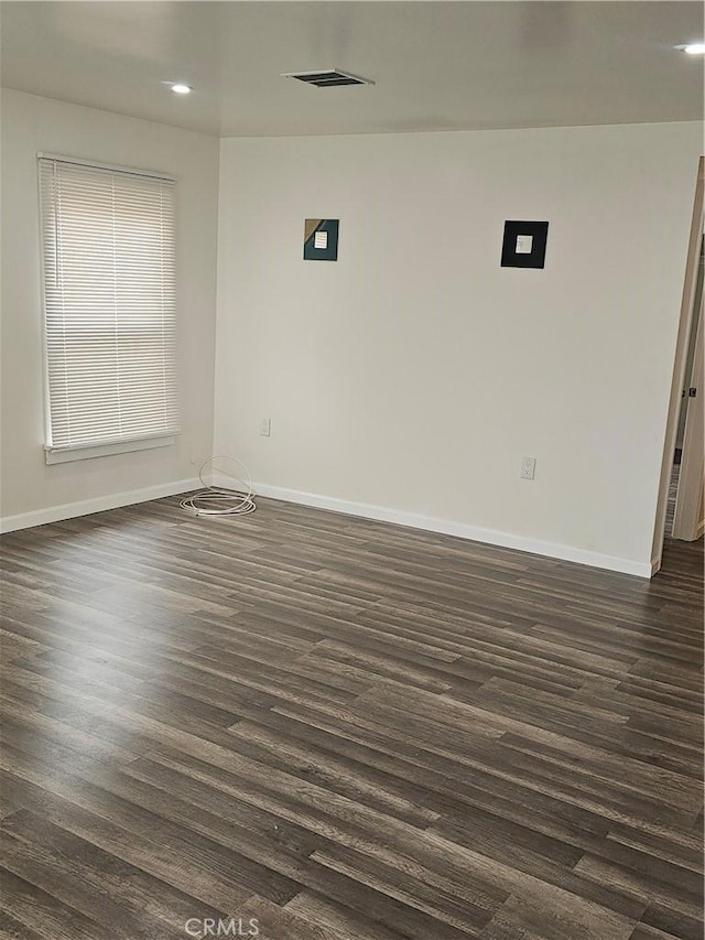 44645 Fig Ave, Lancaster, CA 93534 - empty room featuring baseboards, recessed lighting, and dark wood-type flooring