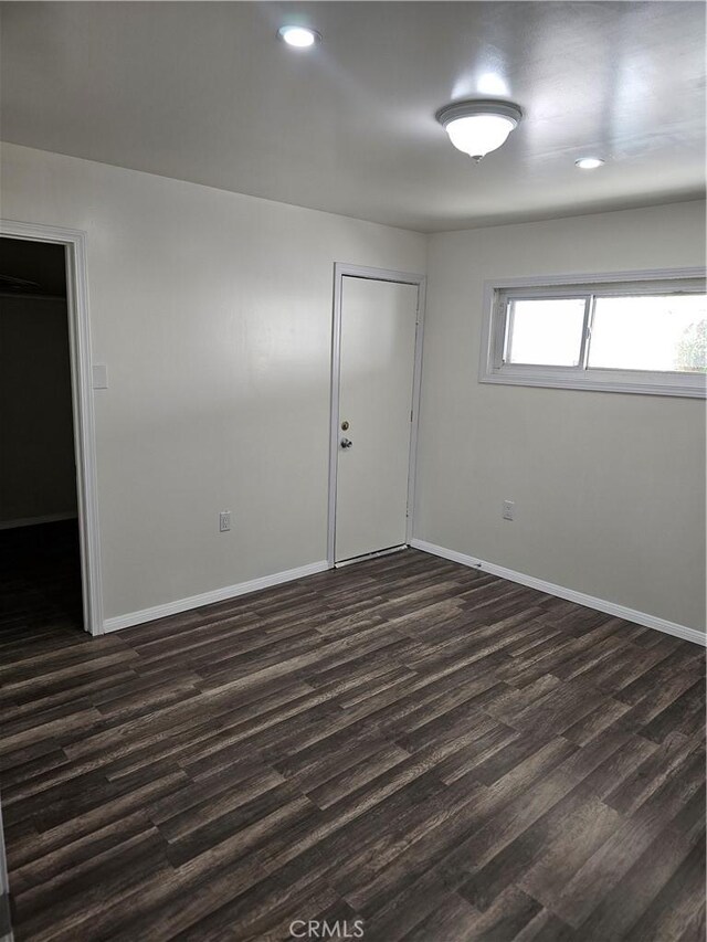 44645 Fig Ave, Lancaster, CA 93534 - spare room with recessed lighting, baseboards, and dark wood finished floors