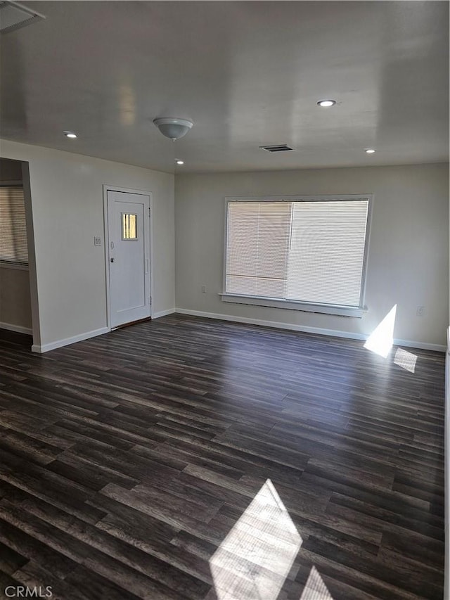44645 Fig Ave, Lancaster, CA 93534 - spare room with recessed lighting, baseboards, visible vents, and dark wood finished floors