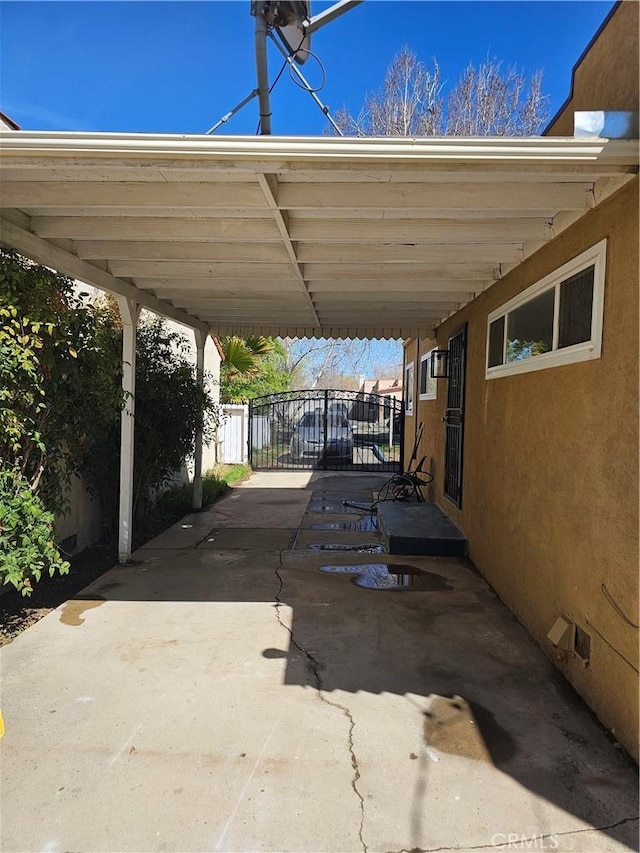 44645 Fig Ave, Lancaster, CA 93534 - view of parking with fence and a carport
