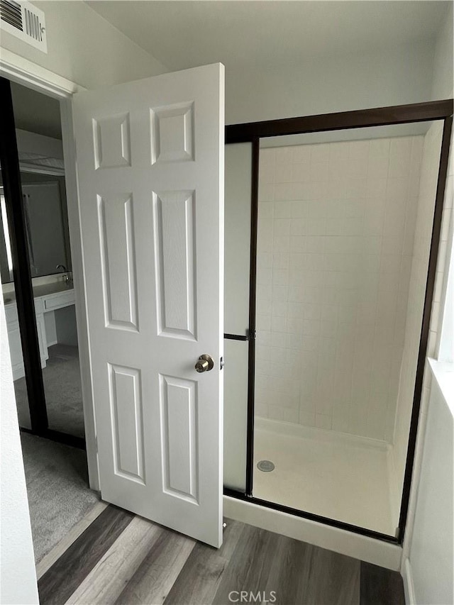 33741 Edgewater Dr Unit 164, Dana Point, CA 92629 - bathroom with wood finished floors and a shower stall