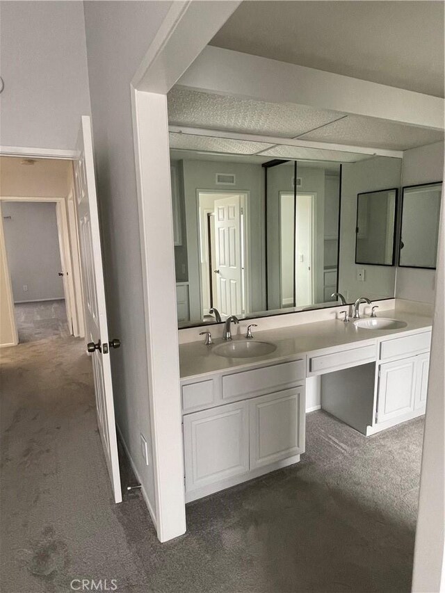 33741 Edgewater Dr Unit 164, Dana Point, CA 92629 - bathroom featuring double vanity and carpet flooring