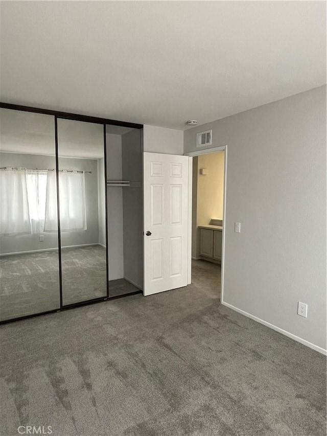 33741 Edgewater Dr Unit 164, Dana Point, CA 92629 - unfurnished bedroom featuring carpet floors, a closet, and baseboards