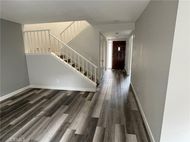 33741 Edgewater Dr Unit 164, Dana Point, CA 92629 - hallway featuring wood finished floors, stairs, and baseboards