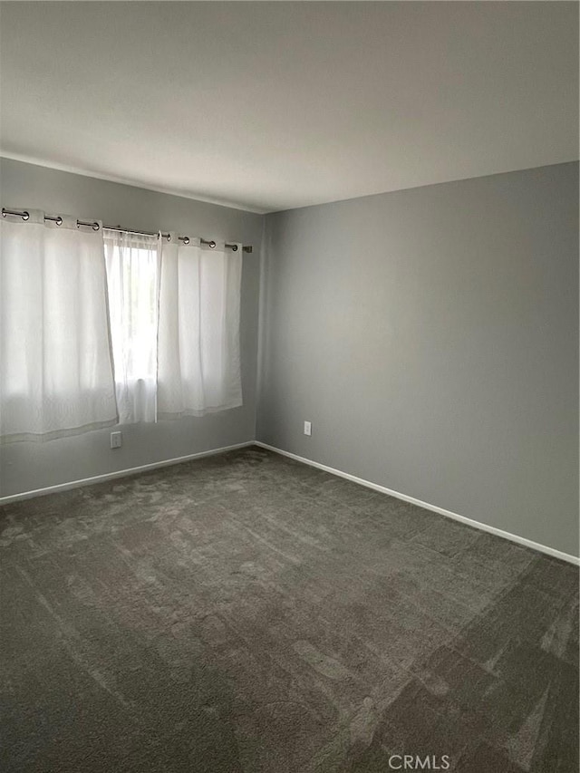 33741 Edgewater Dr Unit 164, Dana Point, CA 92629 - unfurnished room with dark carpet and baseboards