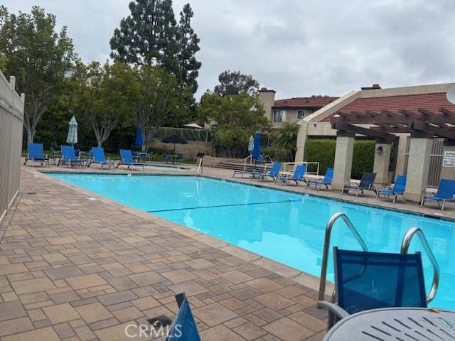 33741 Edgewater Dr Unit 164, Dana Point, CA 92629 - community pool with a pergola, a patio, and fence