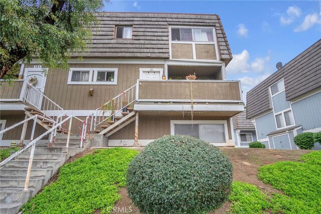 1925 Glenoaks Blvd, Unit San Fernando, CA 91340 - rear view of property featuring stairway