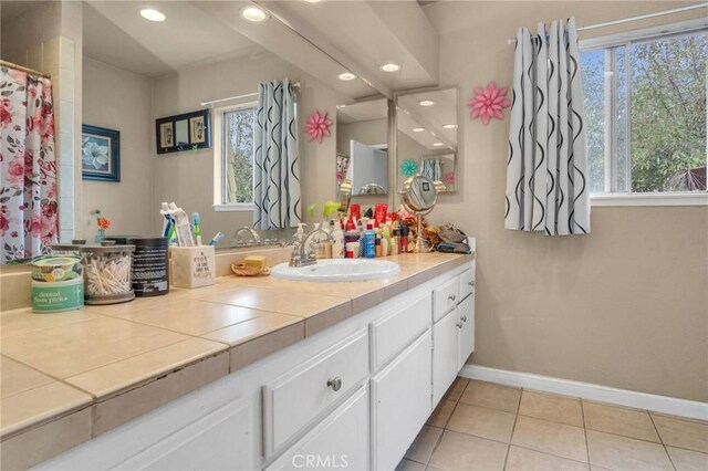 1925 Glenoaks Blvd, Unit San Fernando, CA 91340 - bathroom featuring vanity, baseboards, tile patterned flooring, and recessed lighting