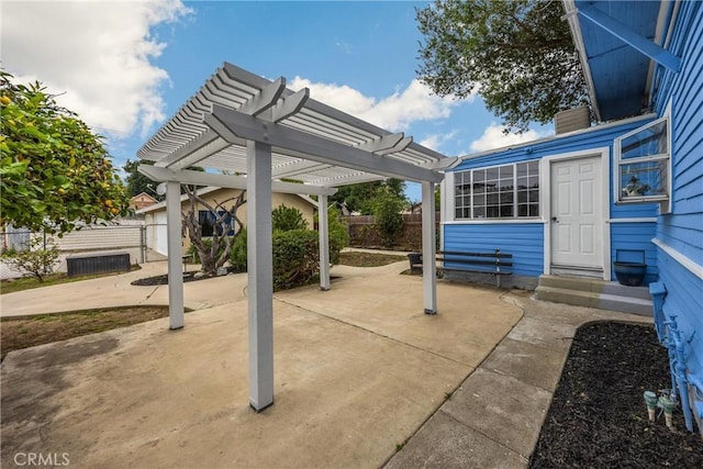 view of patio featuring a pergola, a fenced backyard, and entry steps