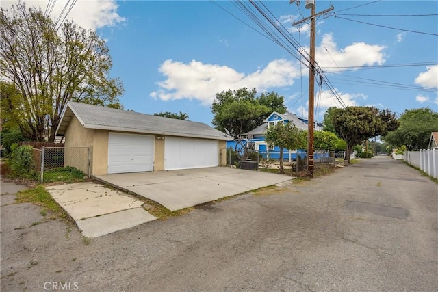 detached garage with fence