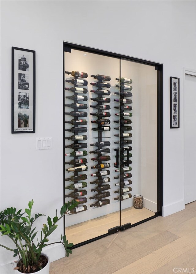 wine room featuring baseboards