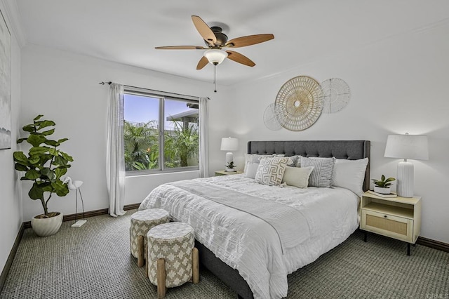 bedroom with baseboards, ceiling fan, and carpet