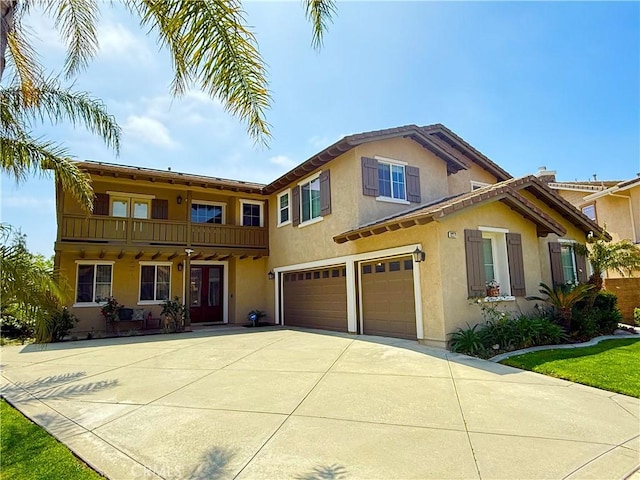 12271 Oldenberg Ct, Rancho Cucamonga, CA 91739 - view of front of property with an attached garage, stucco siding, and concrete driveway