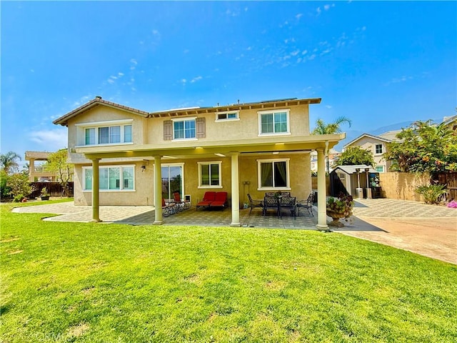 12271 Oldenberg Ct, Rancho Cucamonga, CA 91739 - rear view of property featuring a patio and stucco siding