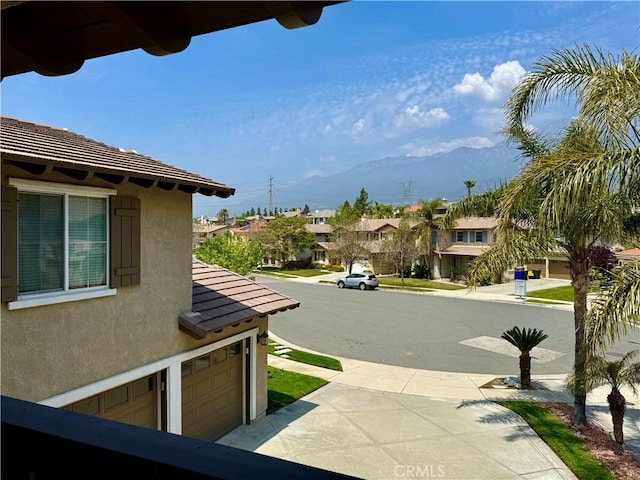 12271 Oldenberg Ct, Rancho Cucamonga, CA 91739 - view of street featuring a mountain view, a residential view, and sidewalks
