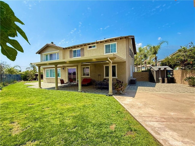 12271 Oldenberg Ct, Rancho Cucamonga, CA 91739 - back of house with a patio area, stucco siding, and cooling unit