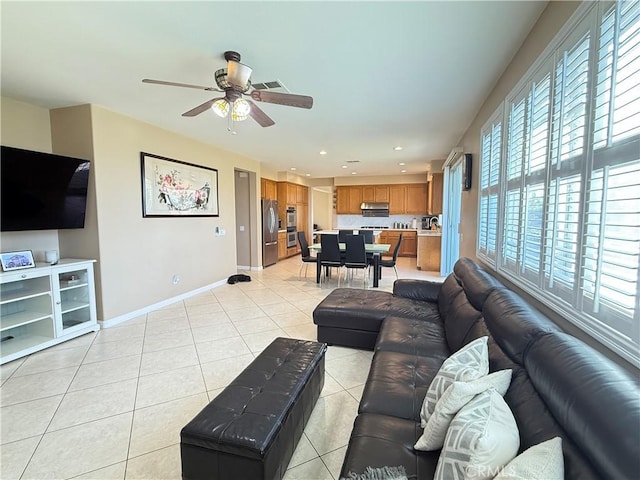 12271 Oldenberg Ct, Rancho Cucamonga, CA 91739 - living area with light tile patterned floors, baseboards, a ceiling fan, and recessed lighting