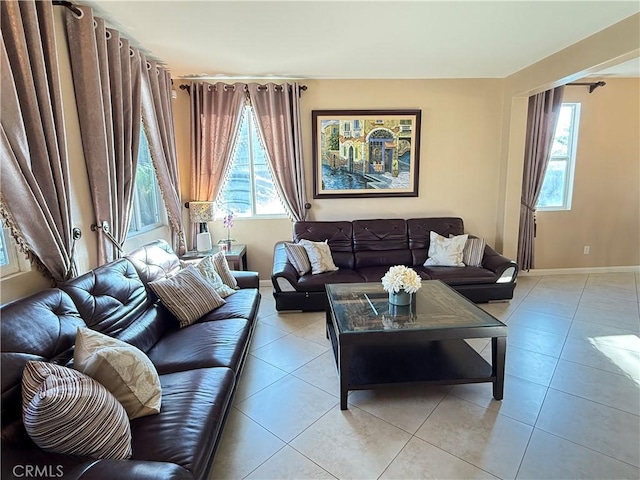 12271 Oldenberg Ct, Rancho Cucamonga, CA 91739 - living area with plenty of natural light, light tile patterned floors, and baseboards