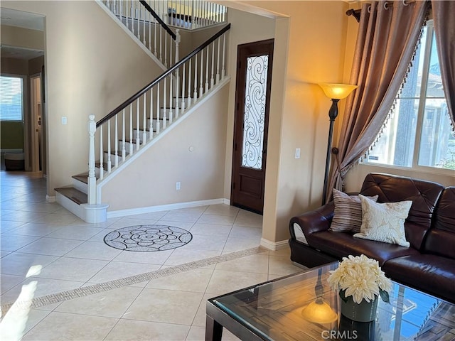 12271 Oldenberg Ct, Rancho Cucamonga, CA 91739 - foyer featuring baseboards, stairs, and light tile patterned floors