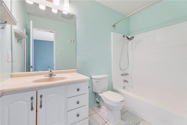 full bathroom featuring tile patterned floors, vanity, toilet, and shower / tub combination