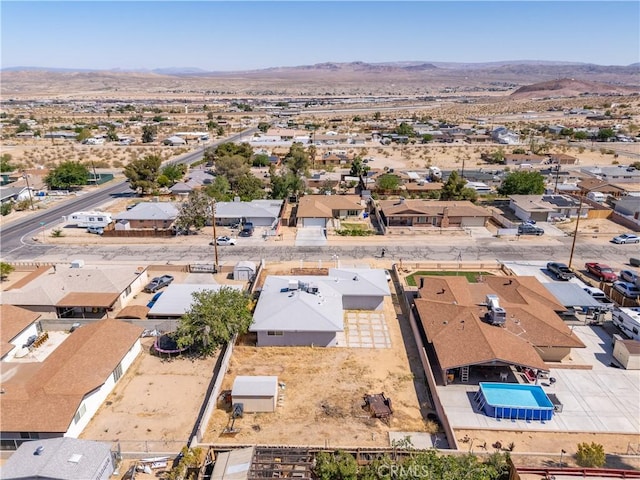 birds eye view of property featuring a residential view and a mountain view