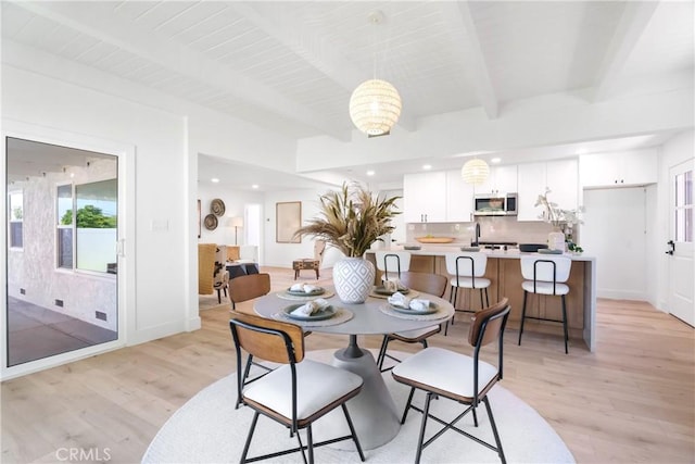 4532 Zella Ln, Yorba Linda, CA 92886 - dining space with baseboards, beam ceiling, and light wood-style flooring